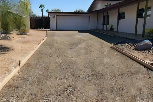 Prepared aggregate base before asphalt placement in Tempe, AZ