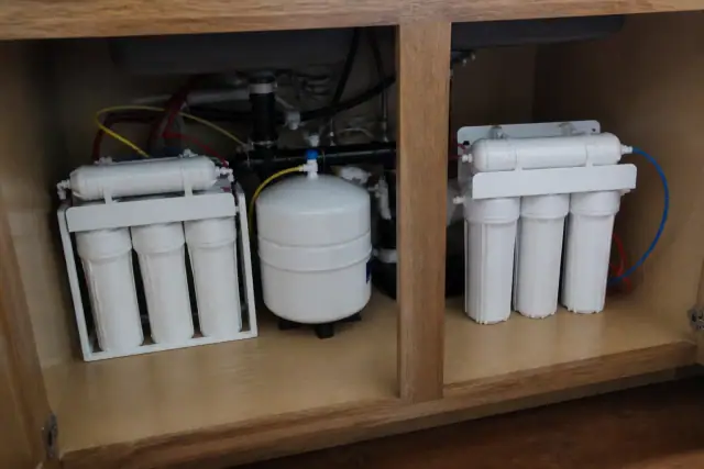 Reverse osmosis water filtration system installed under a kitchen sink in Tempe, AZ.