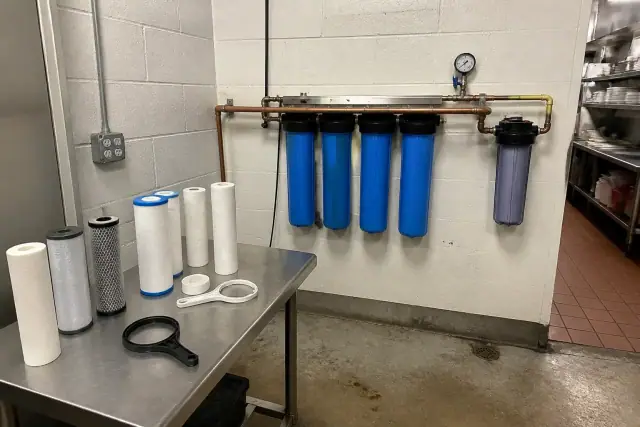 Water filtration system installed in a commercial restaurant utility area in Tempe, AZ.