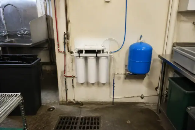 Reverse osmosis water filtration system installed in a restaurant utility room in Tempe, AZ.