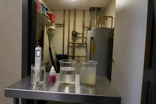 Water quality testing equipment on a workbench in a utility closet in Tempe, AZ.